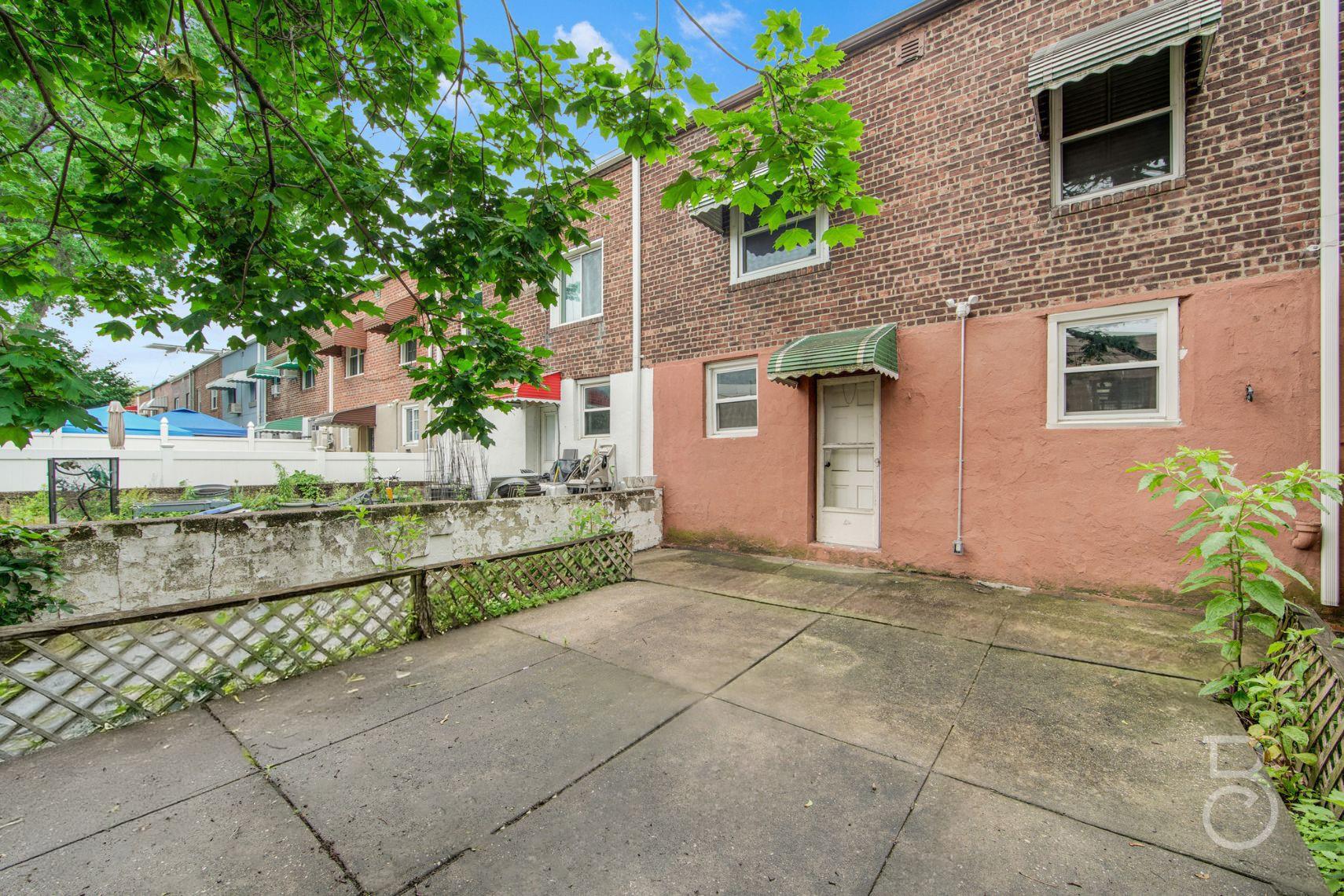 53-66 62nd Street Queens, NY 11378 - Photo 19 of 19 a view of a house with a yard