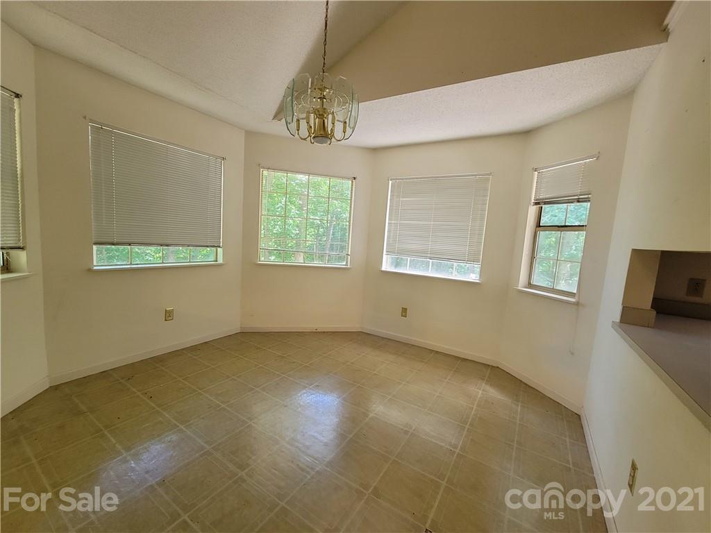 9640 Surrey Road Mint Hill, NC 28227 - Photo 12 of 18 a view of an empty room with a window