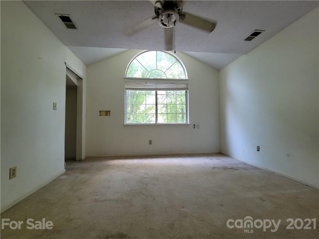 9640 Surrey Road Mint Hill, NC 28227 - Photo 14 of 18 an empty room with a window