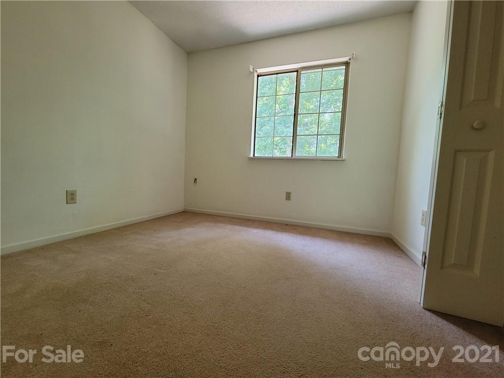 9640 Surrey Road Mint Hill, NC 28227 - Photo 16 of 18 an empty room with a window