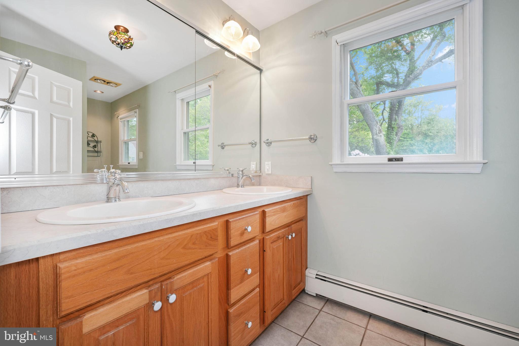 681 Brintons Bridge Road West Chester, PA 19382 - Photo 45 of 64 Hall Bath with Double Sinks