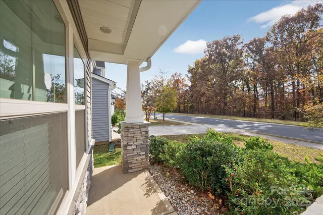 a view of backyard with seating space