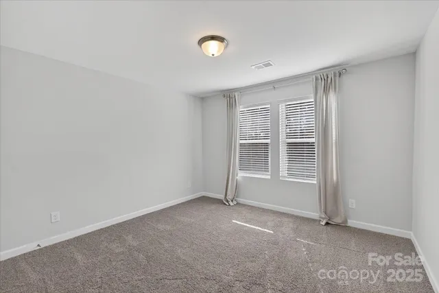 a view of a porch and garden