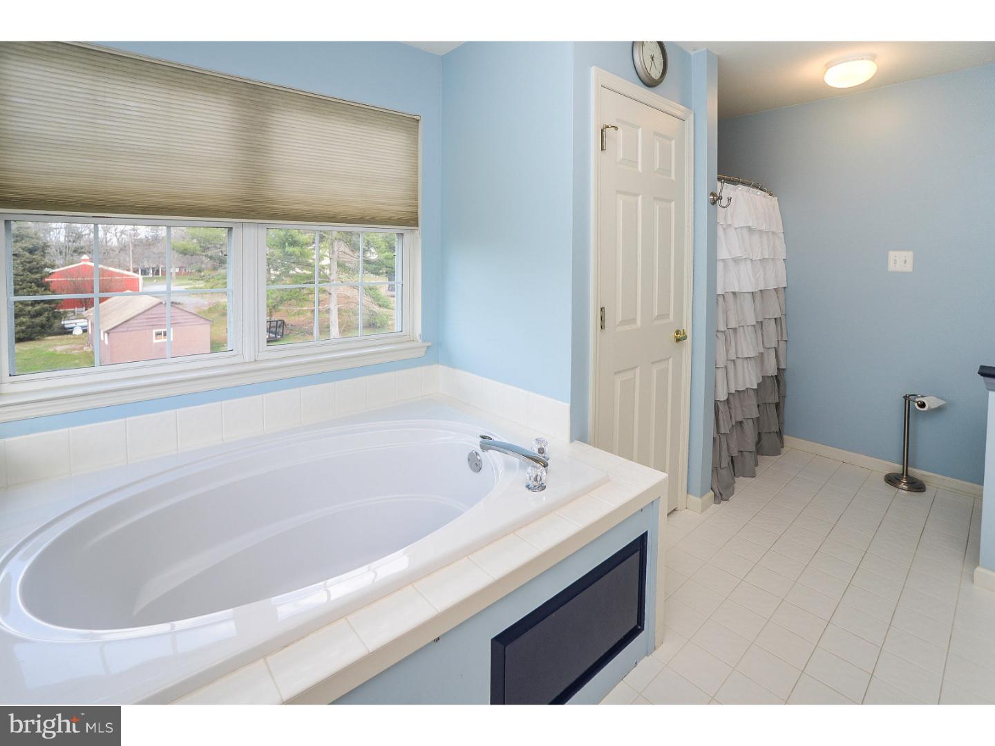 22 Stone Ridge Drive Mickleton, NJ 08056 - Photo 11 of 25 a bathroom with a bathtub and a sink