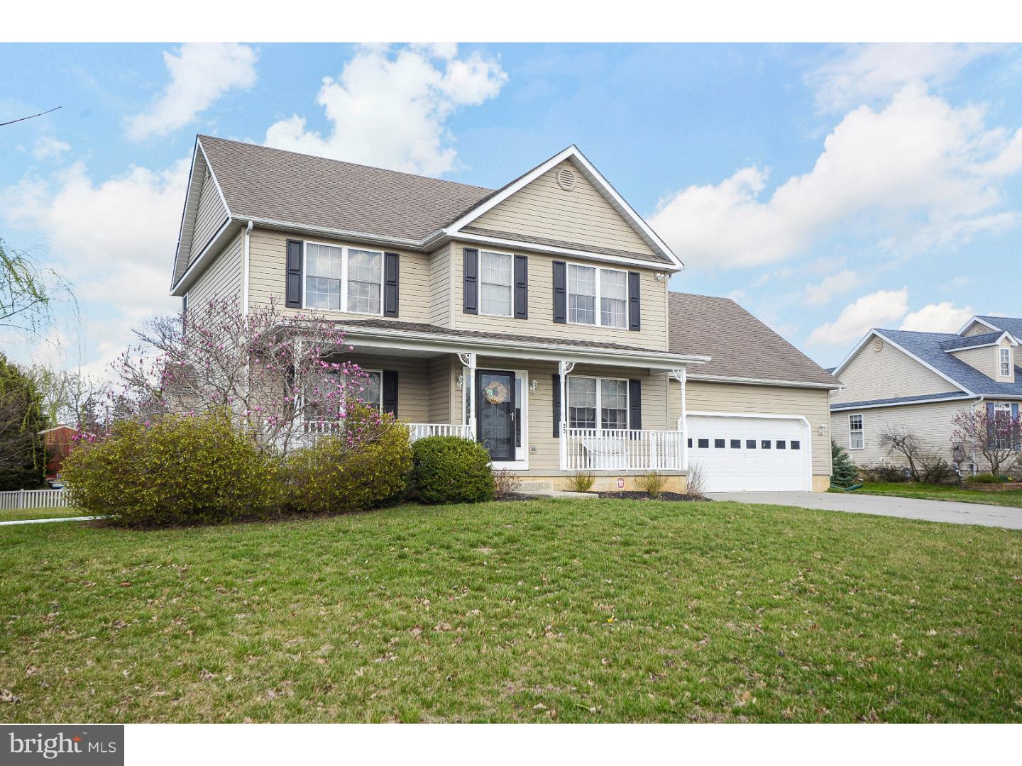 22 Stone Ridge Drive Mickleton, NJ 08056 - Photo 22 of 25 a front view of a house with a yard