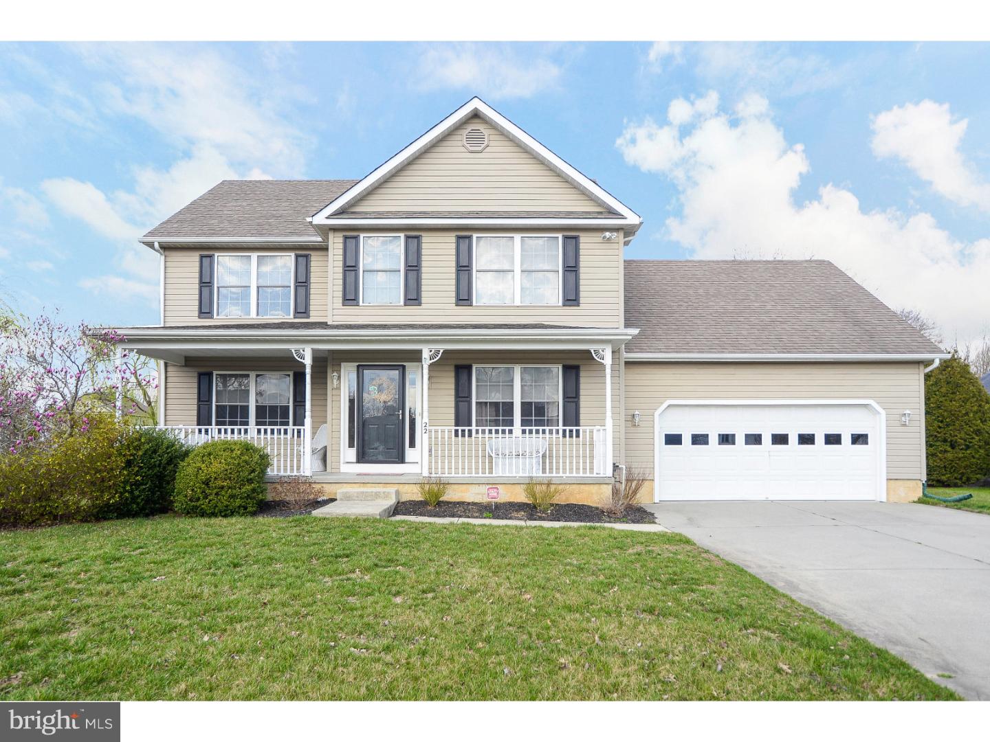 22 Stone Ridge Drive Mickleton, NJ 08056 - Photo 24 of 25 a front view of a house with a yard