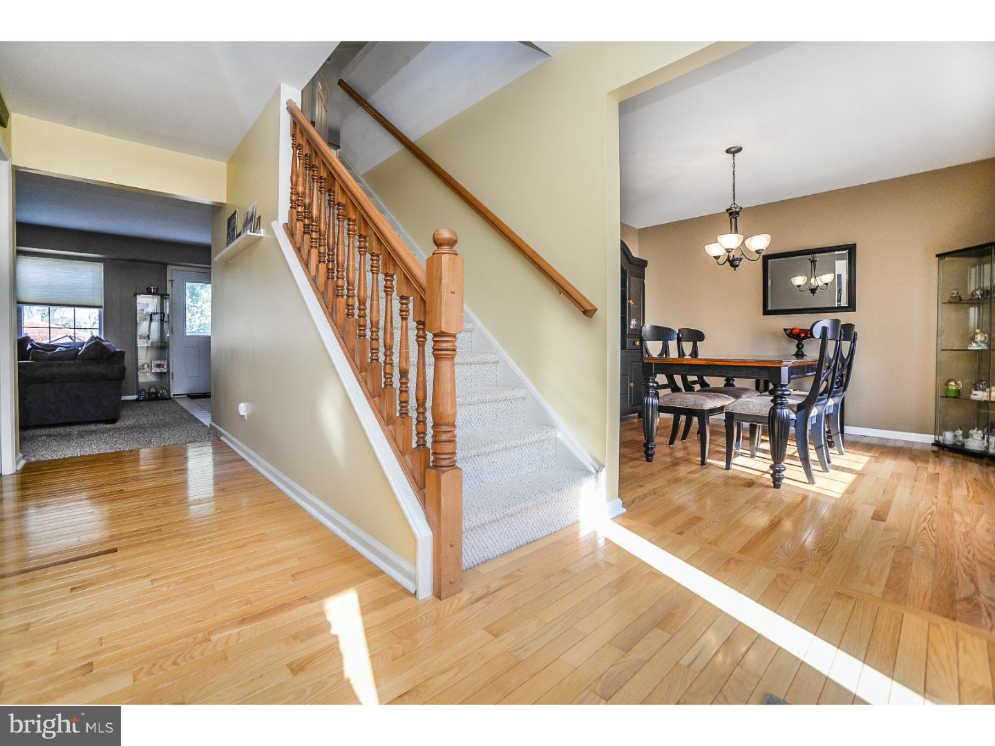 22 Stone Ridge Drive Mickleton, NJ 08056 - Photo 7 of 25 a view of dining room with furniture entryway and wooden floor