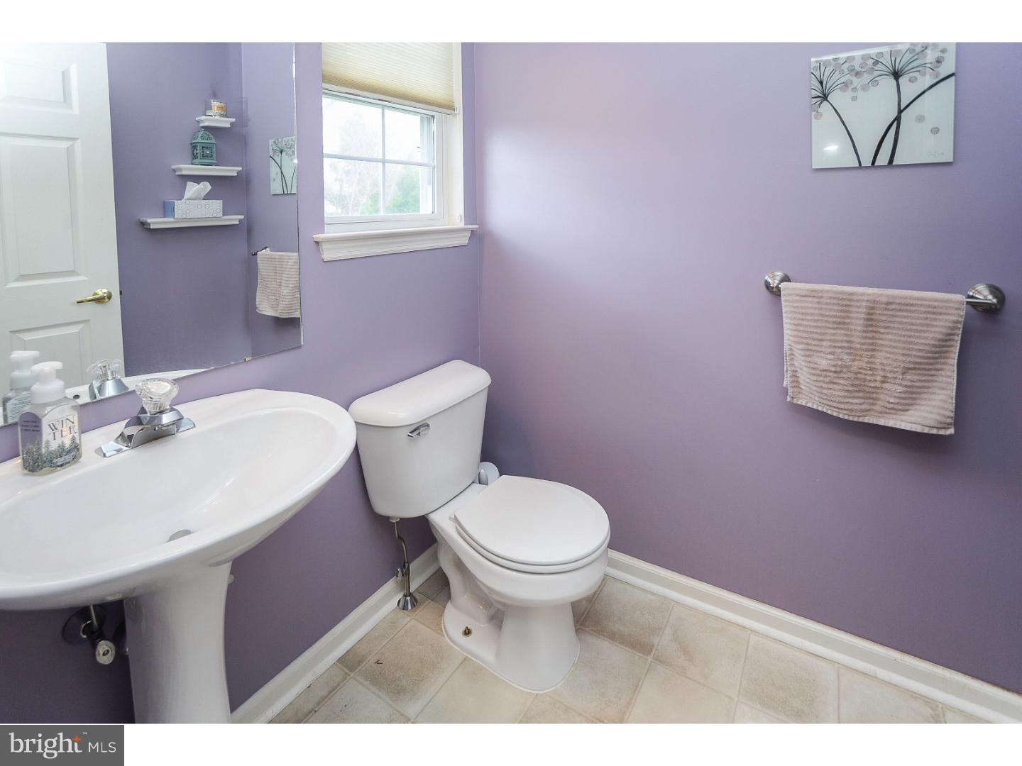 22 Stone Ridge Drive Mickleton, NJ 08056 - Photo 10 of 25 a bathroom with a sink toilet and a window