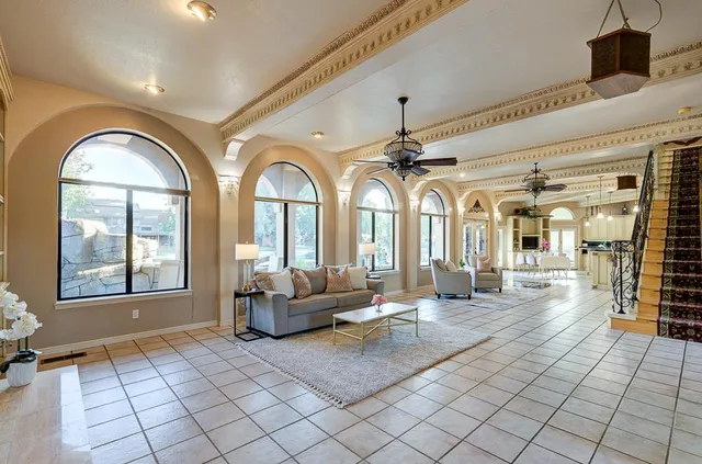 a view of a dining room with furniture window and outside view