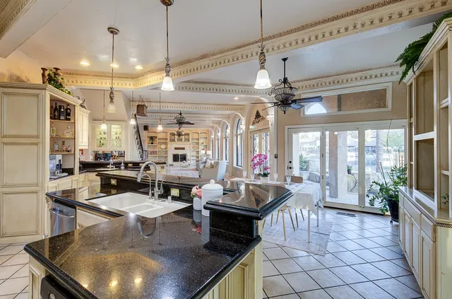 a bathroom with a toilet and a mirror