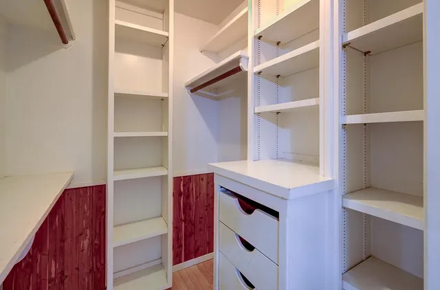 a couple of table and chairs in front of building