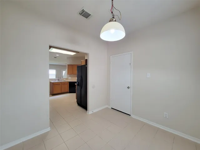 a view of a kitchen and a sink