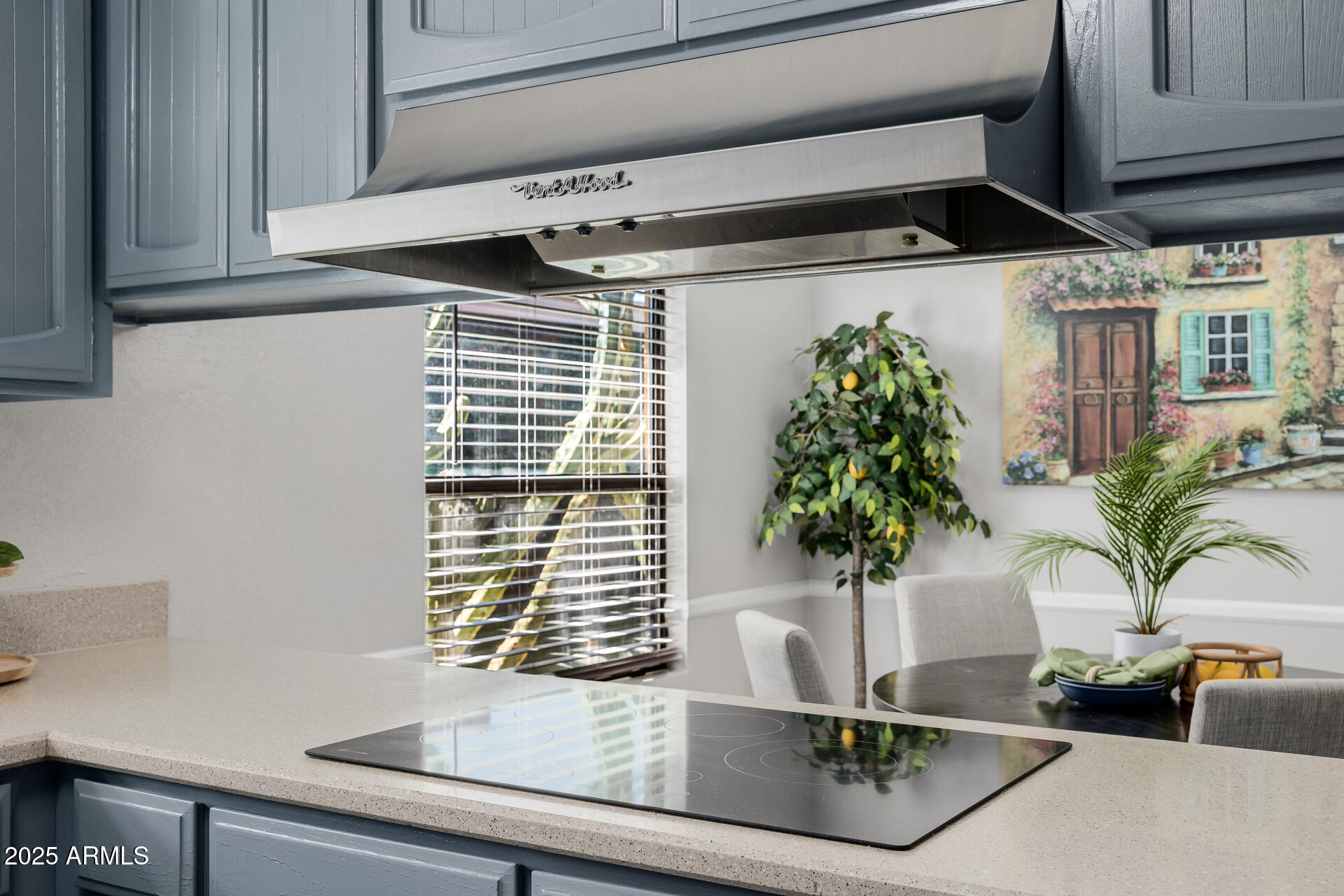 7615 East Tucson Road Scottsdale, AZ 85258 - Photo 15 of 54 a vase of flowers sitting on a shelf