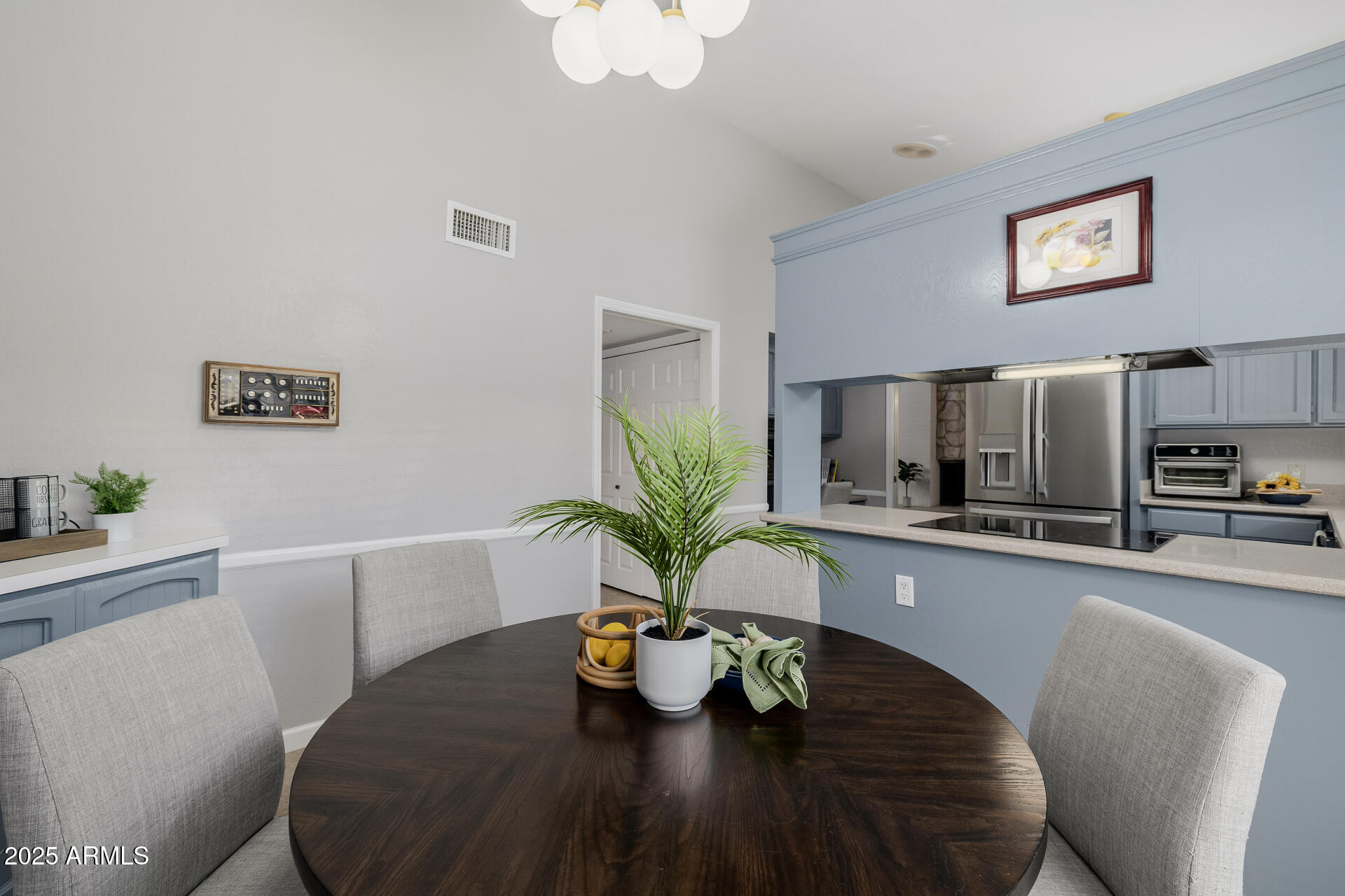 7615 East Tucson Road Scottsdale, AZ 85258 - Photo 21 of 54 a dining room with furniture and view of kitchen