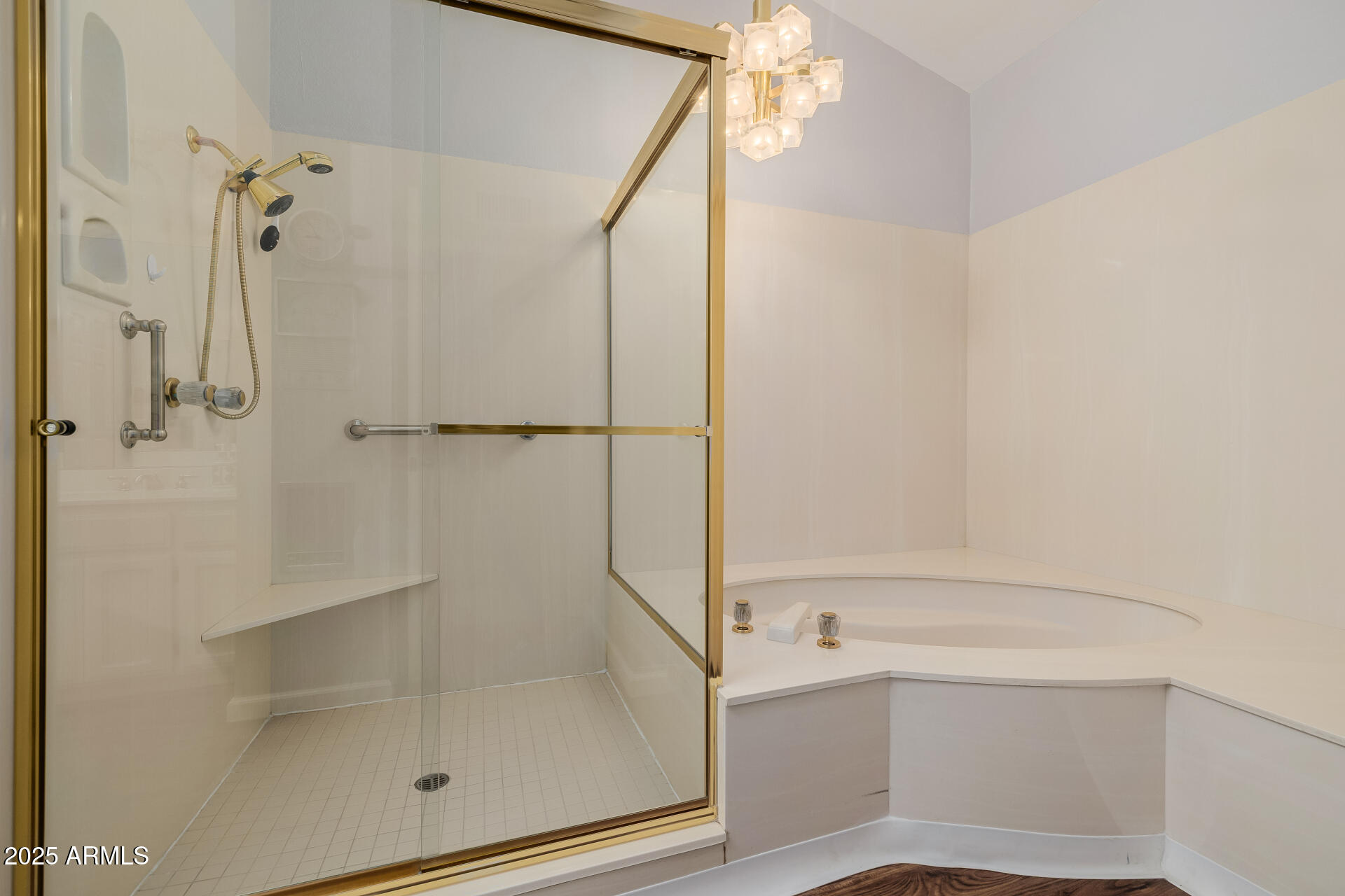 7615 East Tucson Road Scottsdale, AZ 85258 - Photo 25 of 54 a bathroom with a bathtub and a shower