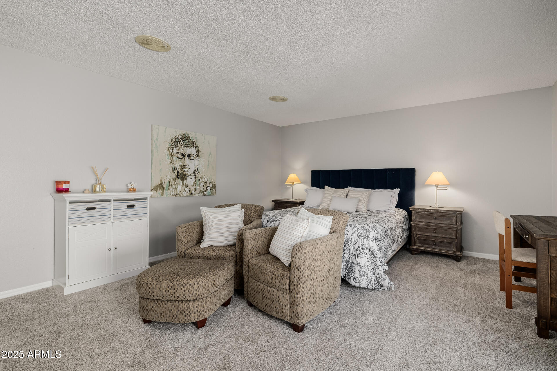 7615 East Tucson Road Scottsdale, AZ 85258 - Photo 31 of 54 a bed room with furniture and a lamp