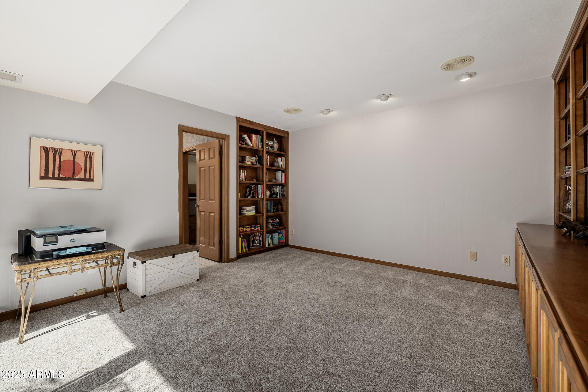 7615 East Tucson Road Scottsdale, AZ 85258 - Photo 35 of 54 a view of a livingroom with furniture and window