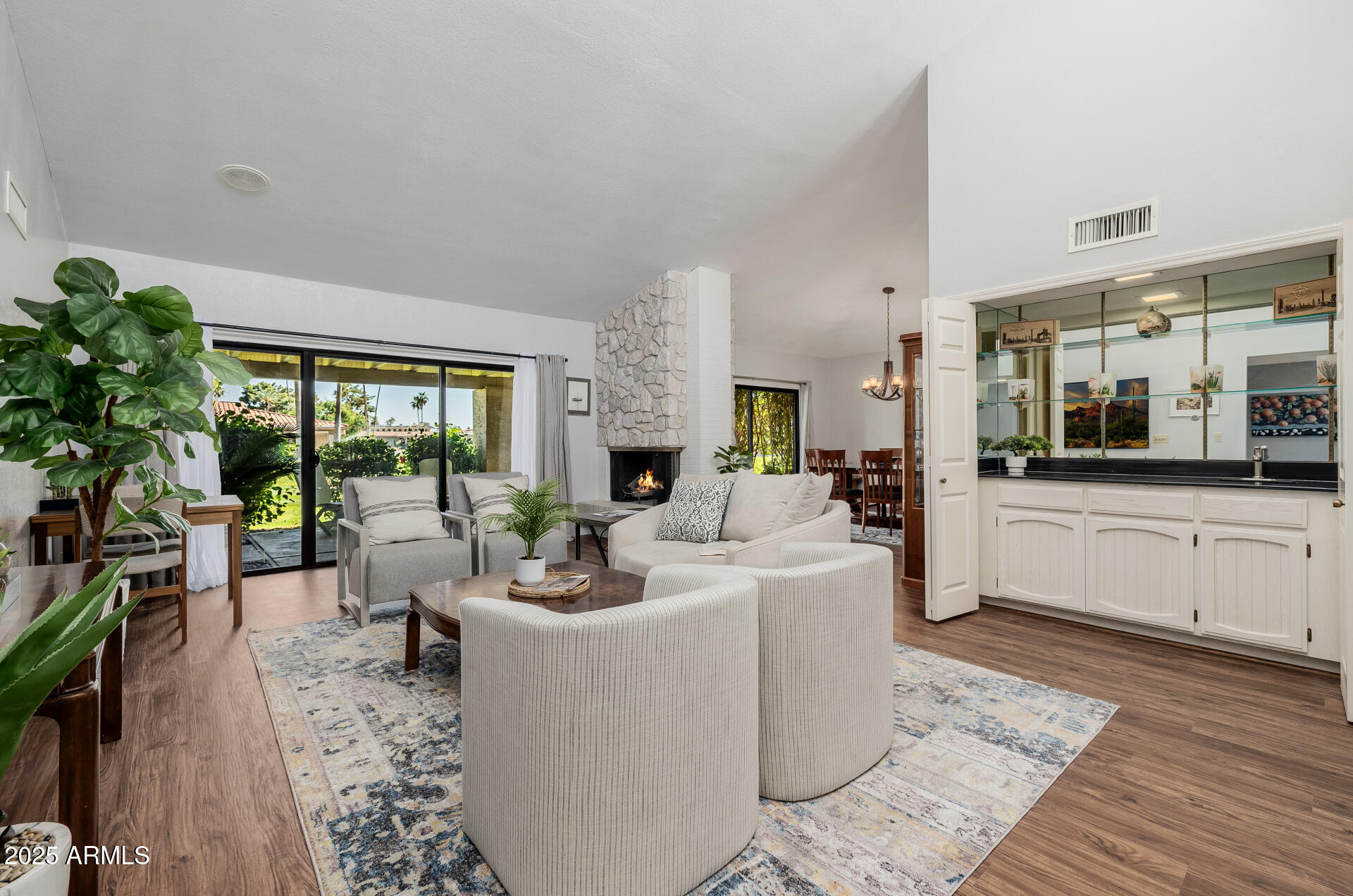 7615 East Tucson Road Scottsdale, AZ 85258 - Photo 6 of 54 a living room with furniture and a large window
