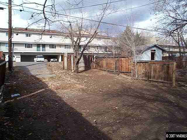 1945 Wilder Street Reno, NV 89512 - Photo 5 of 9 a view of a large yard with a large tree