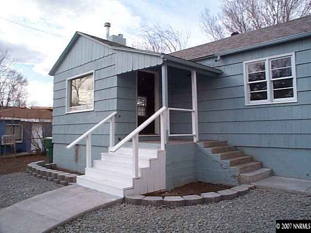 1945 Wilder Street Reno, NV 89512 - Photo 7 of 9 a view of a house with wooden fence