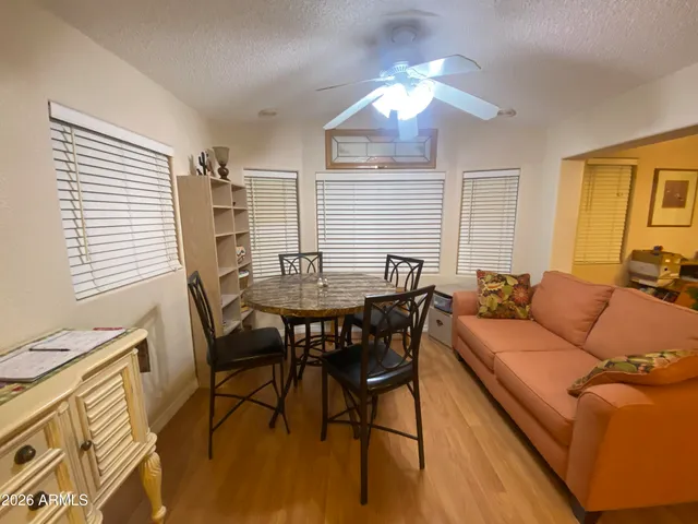 a view of a livingroom with furniture and window