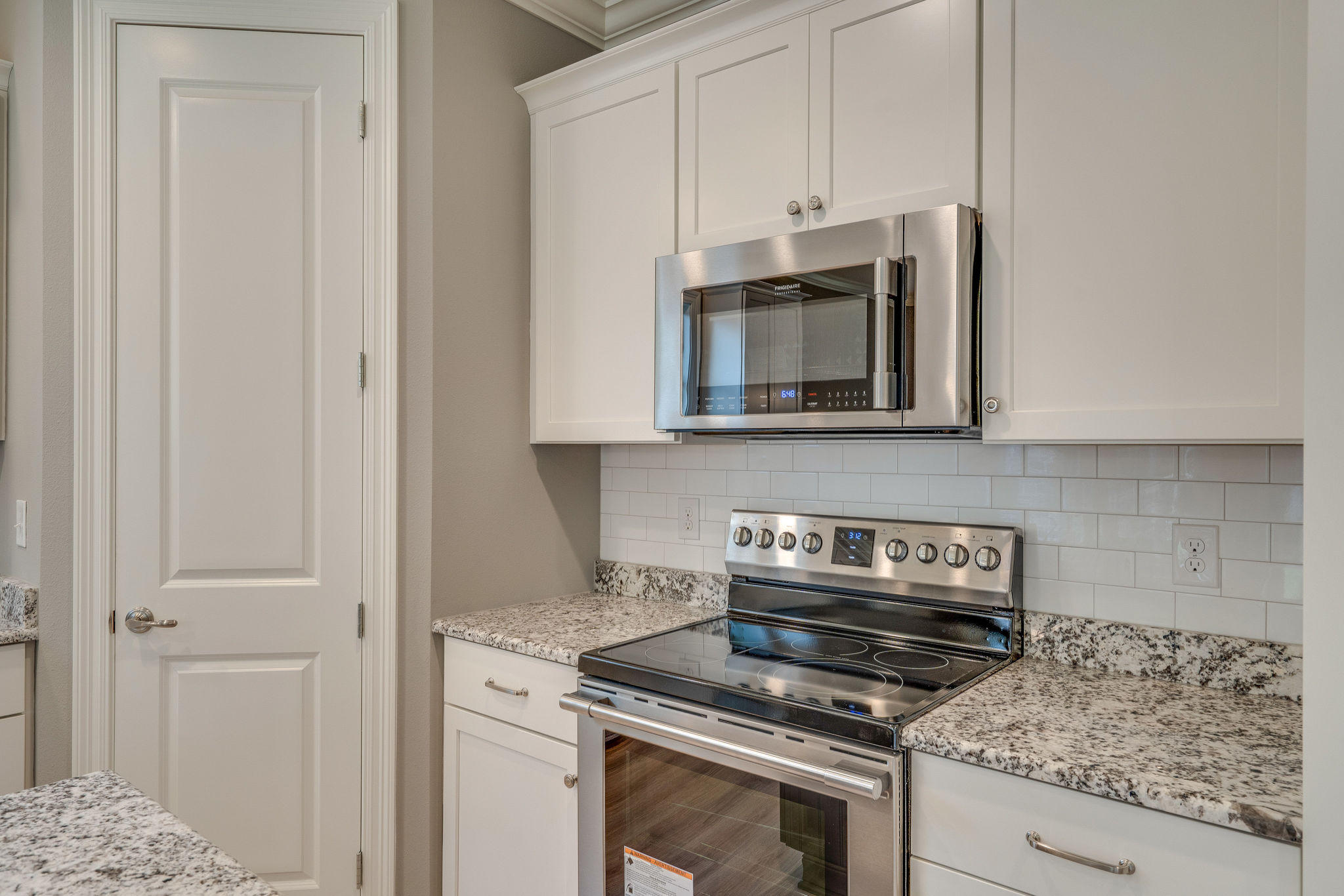 105 Creve Core Drive Crestview, FL 32539 - Photo 5 of 14 a kitchen with appliances a sink and cabinets