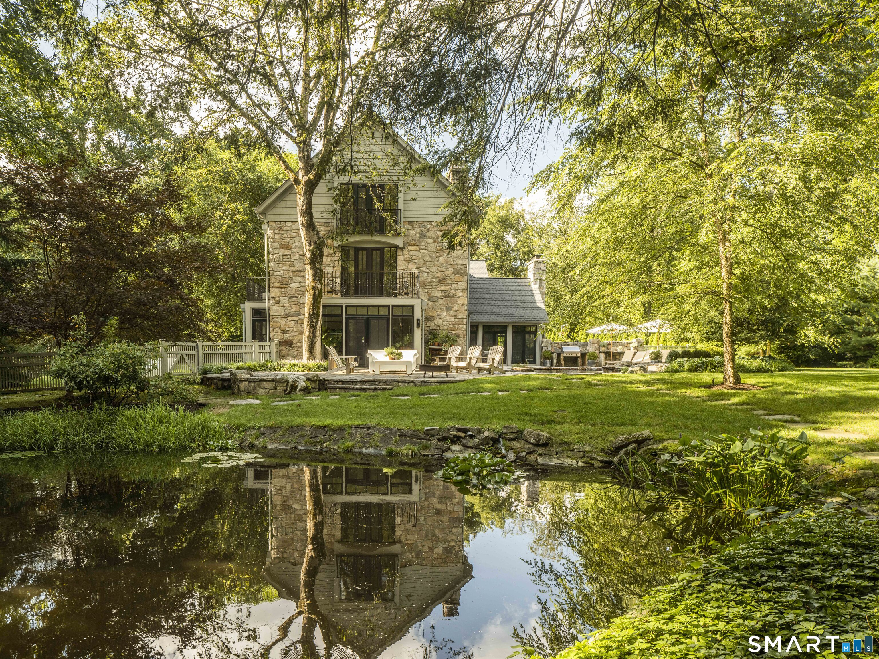 31 Stony Brook Road Westport, CT 06880 - Photo 33 of 36 a view of a house with a yard