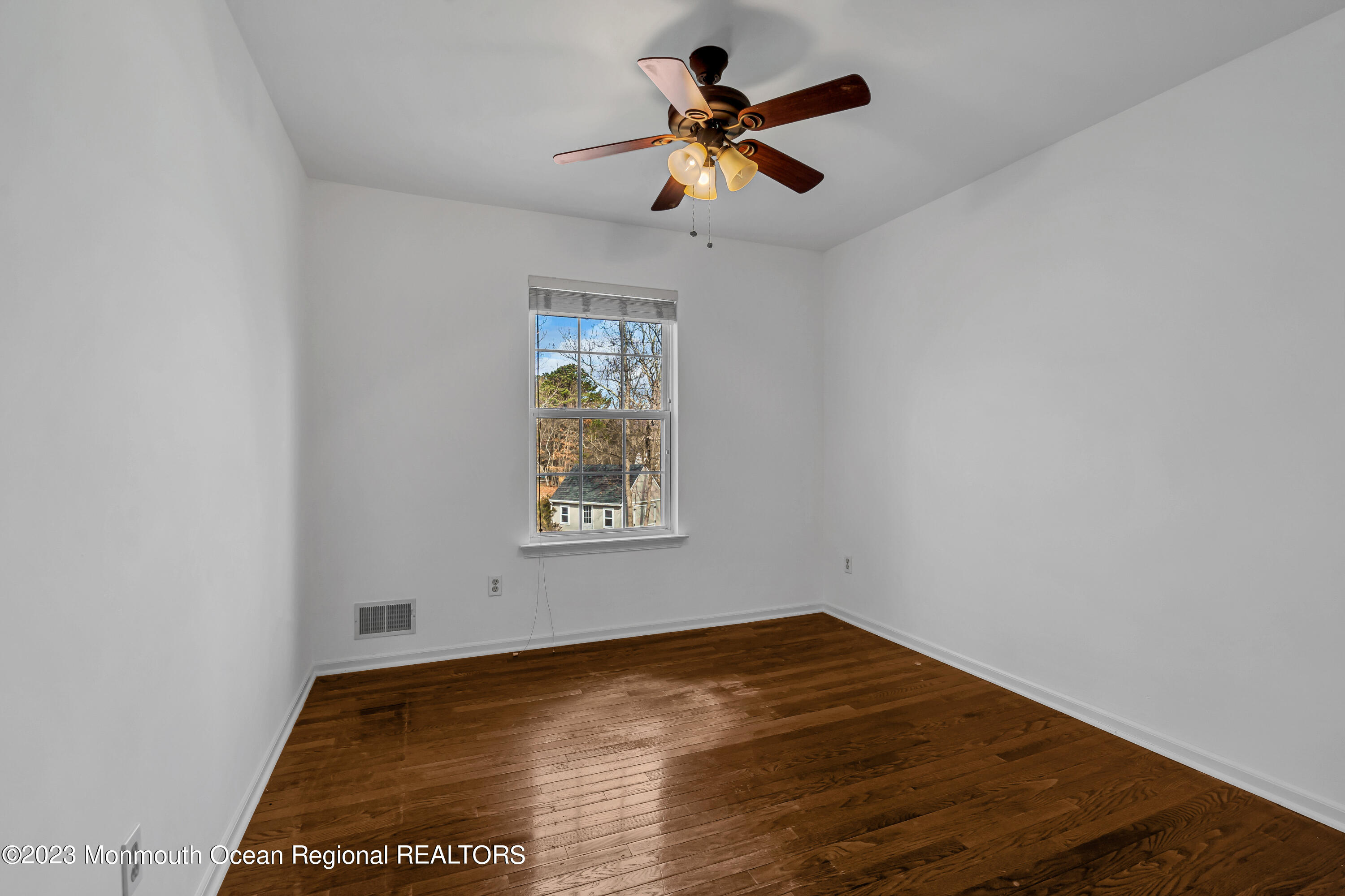 796 Harmony Road Jackson, NJ 08527 - Photo 18 of 22 a view of an empty room with a window