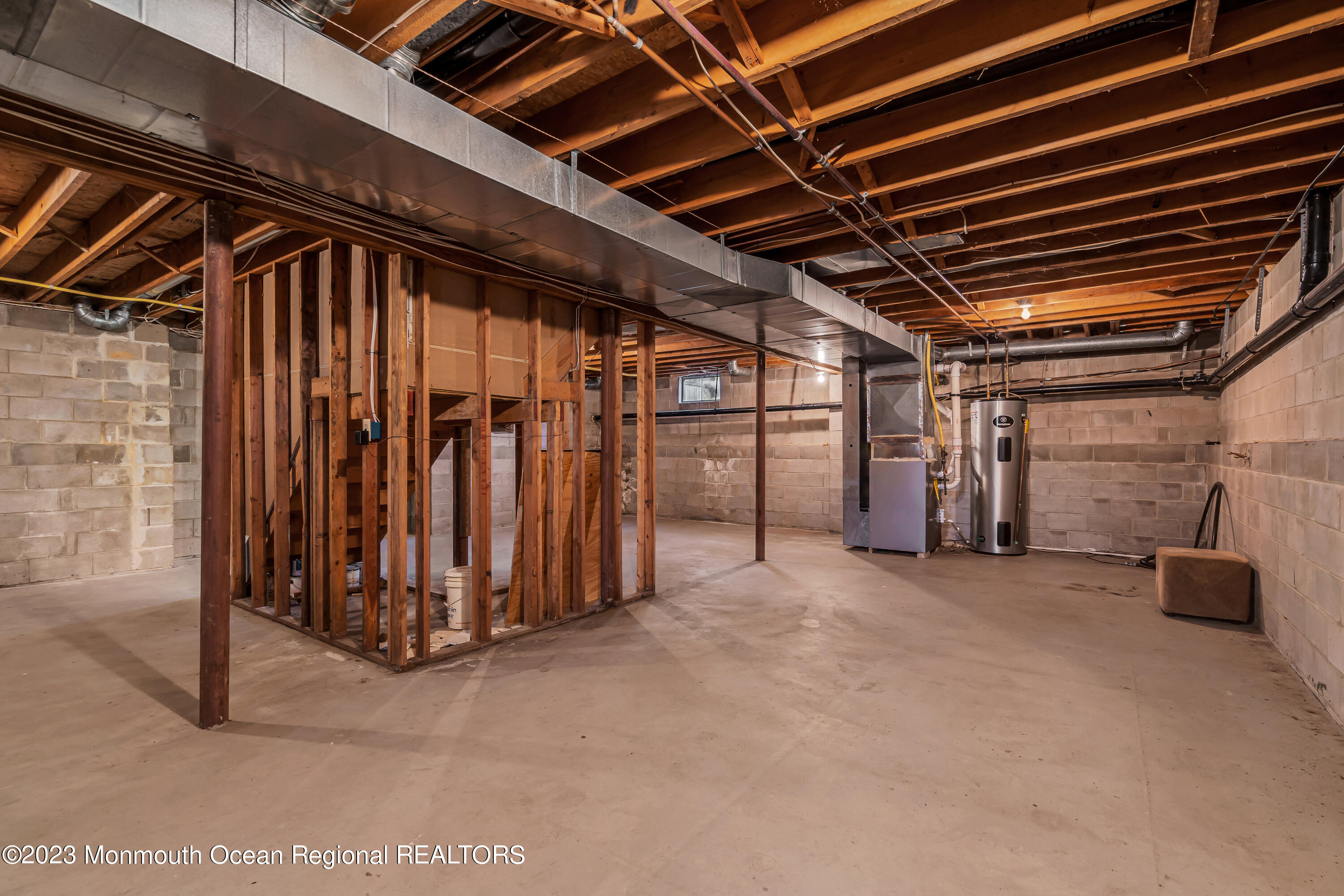 796 Harmony Road Jackson, NJ 08527 - Photo 20 of 22 a view of an empty room with wooden walls