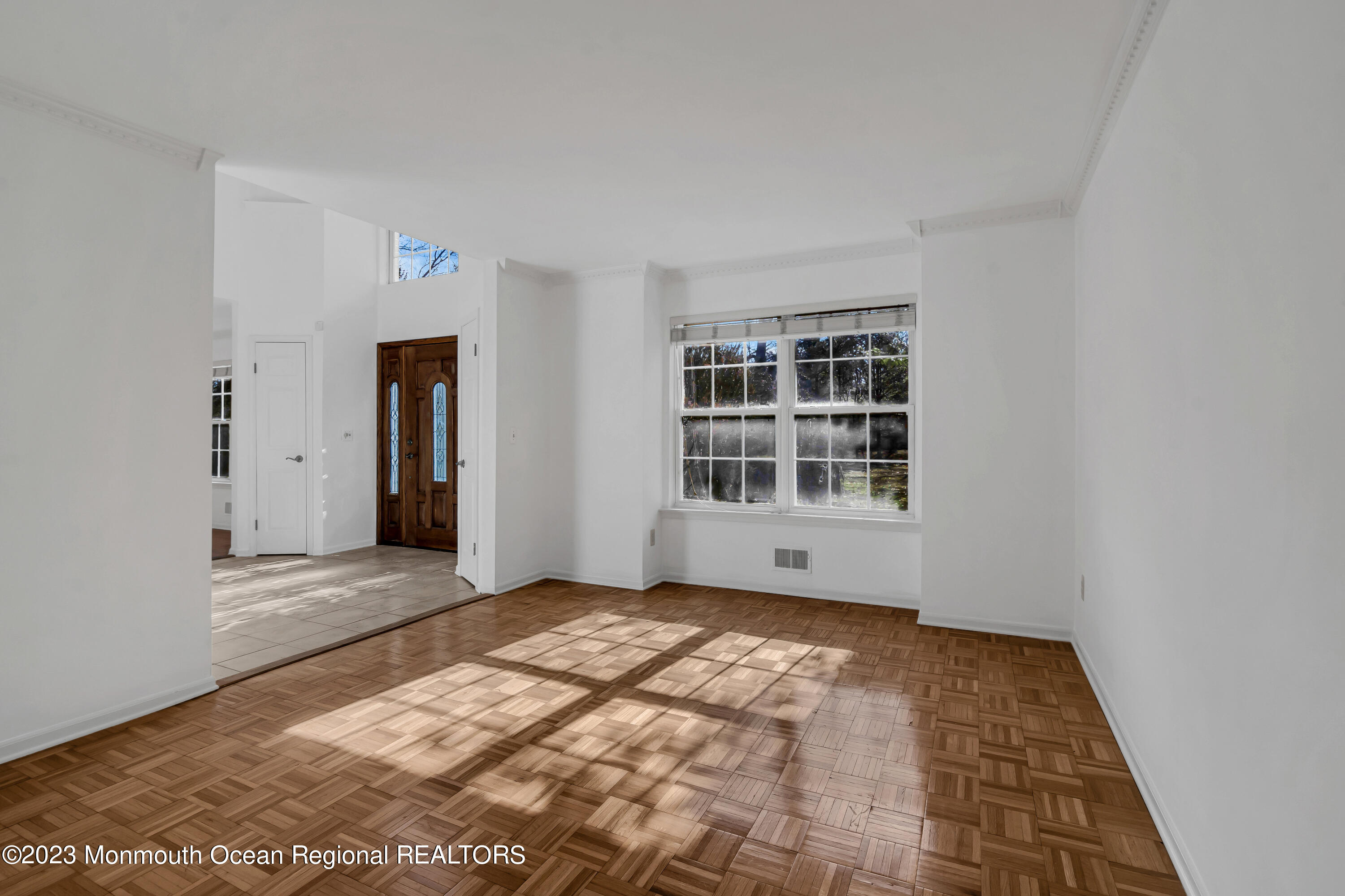 796 Harmony Road Jackson, NJ 08527 - Photo 5 of 22 a view of an empty room with a window