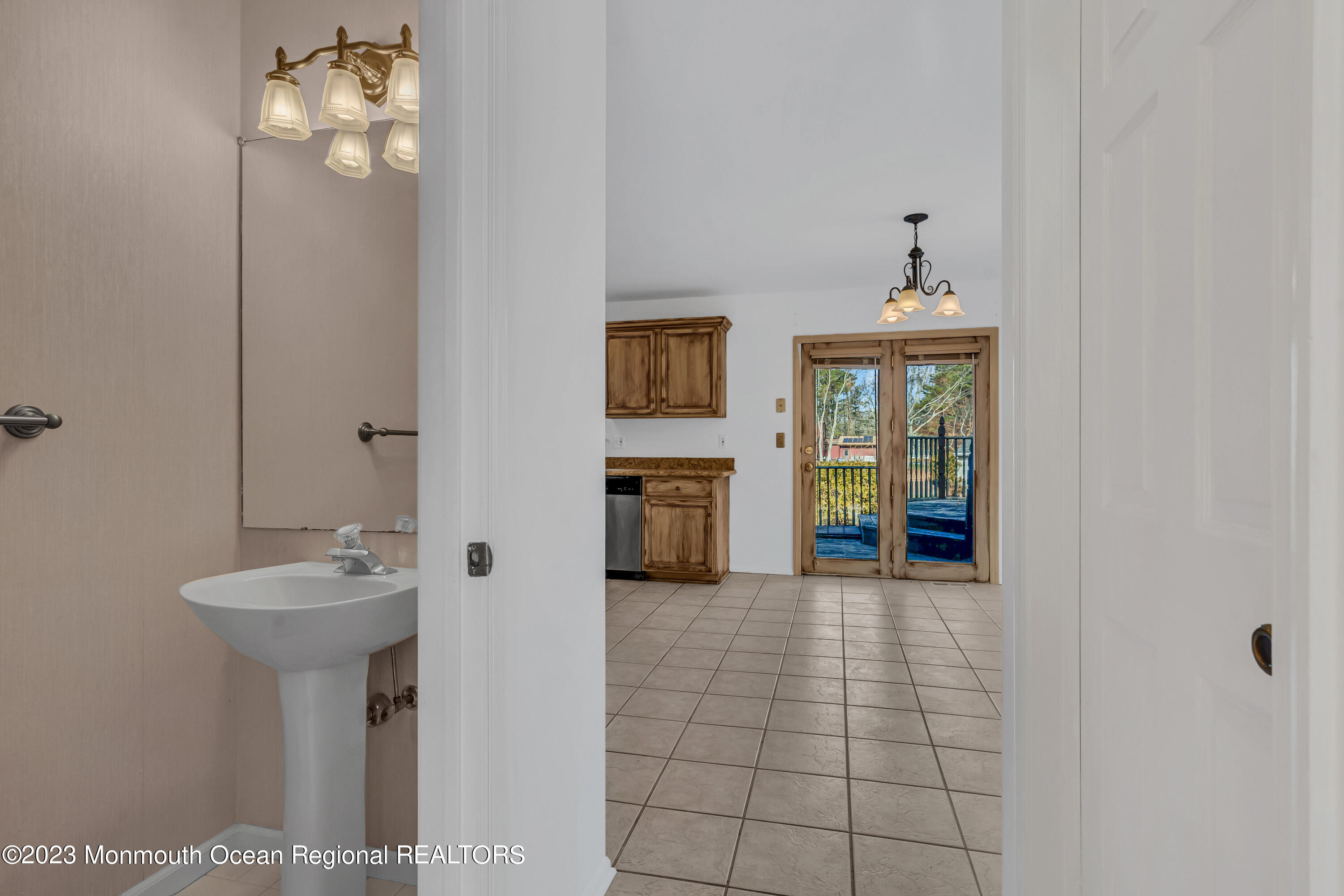 796 Harmony Road Jackson, NJ 08527 - Photo 7 of 22 a bathroom with a sink and a mirror