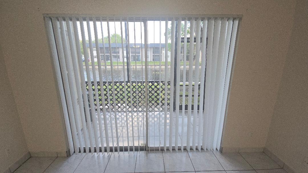 8040 North Colony Circle, Unit 102 Tamarac, FL 33321 - Photo 16 of 17 a view of a bathroom