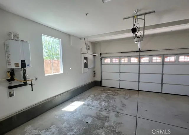 an empty room with a empty space and window