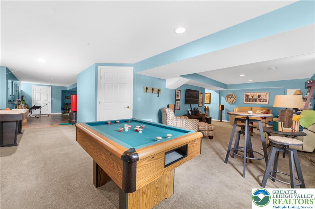 5616 Snowdrift Road Orefield, PA 18069 - Photo 24 of 36 A well-lit recreational space featuring a billiards table, perfect for entertaining.
