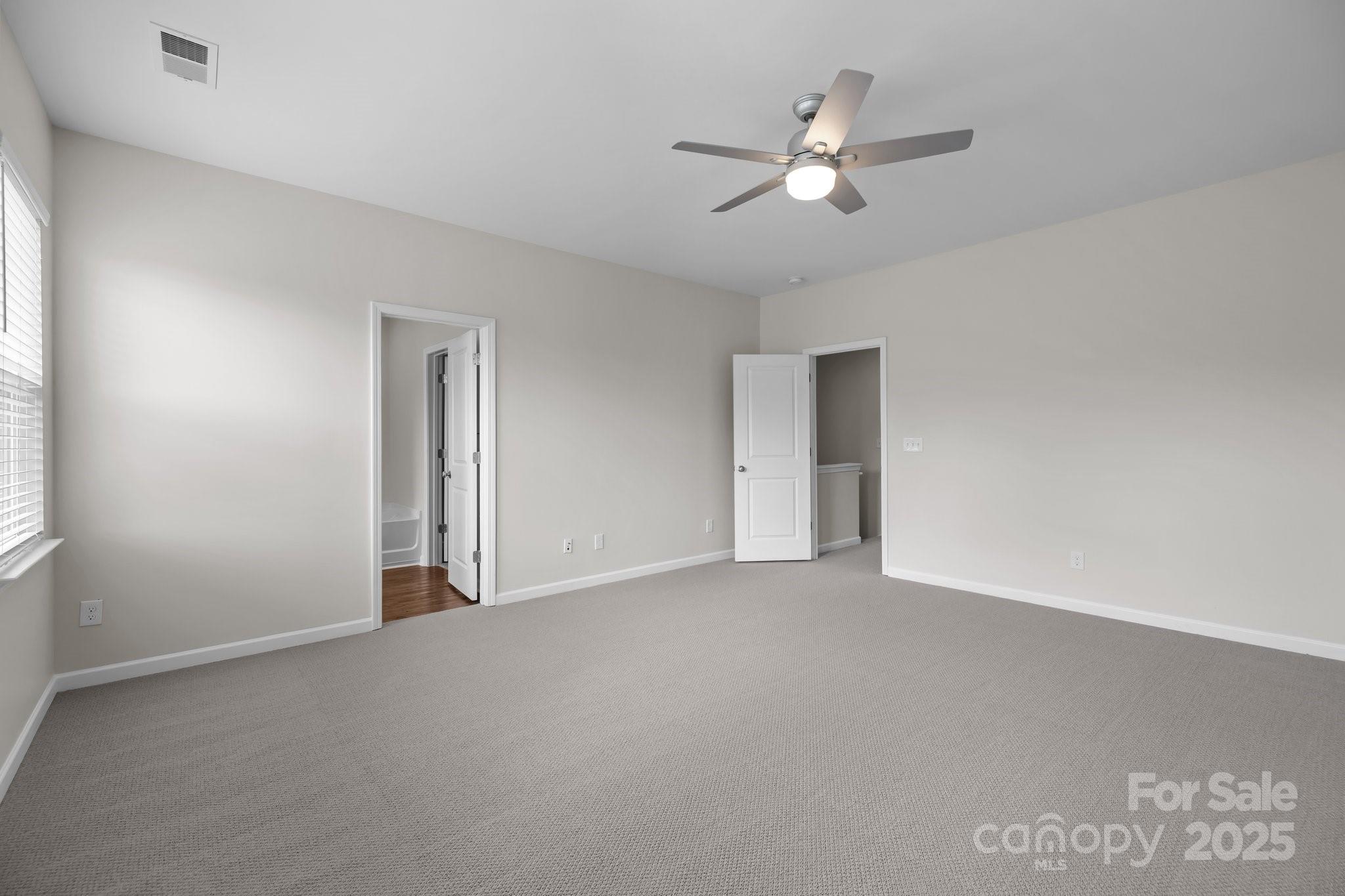 206 Overstone Court Fort Mill, SC 29715 - Photo 16 of 47 a view of an empty room with a window