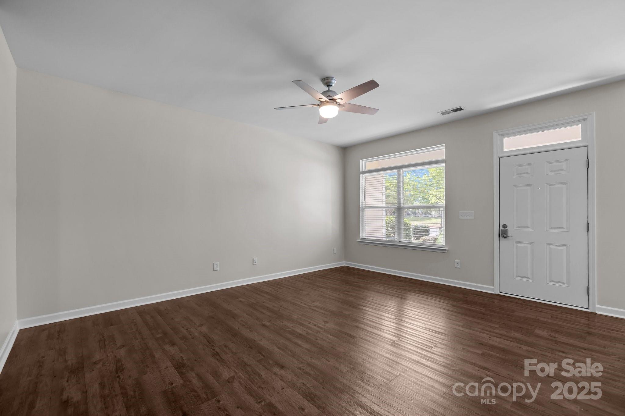 206 Overstone Court Fort Mill, SC 29715 - Photo 25 of 47 wooden floor in an empty room with a window