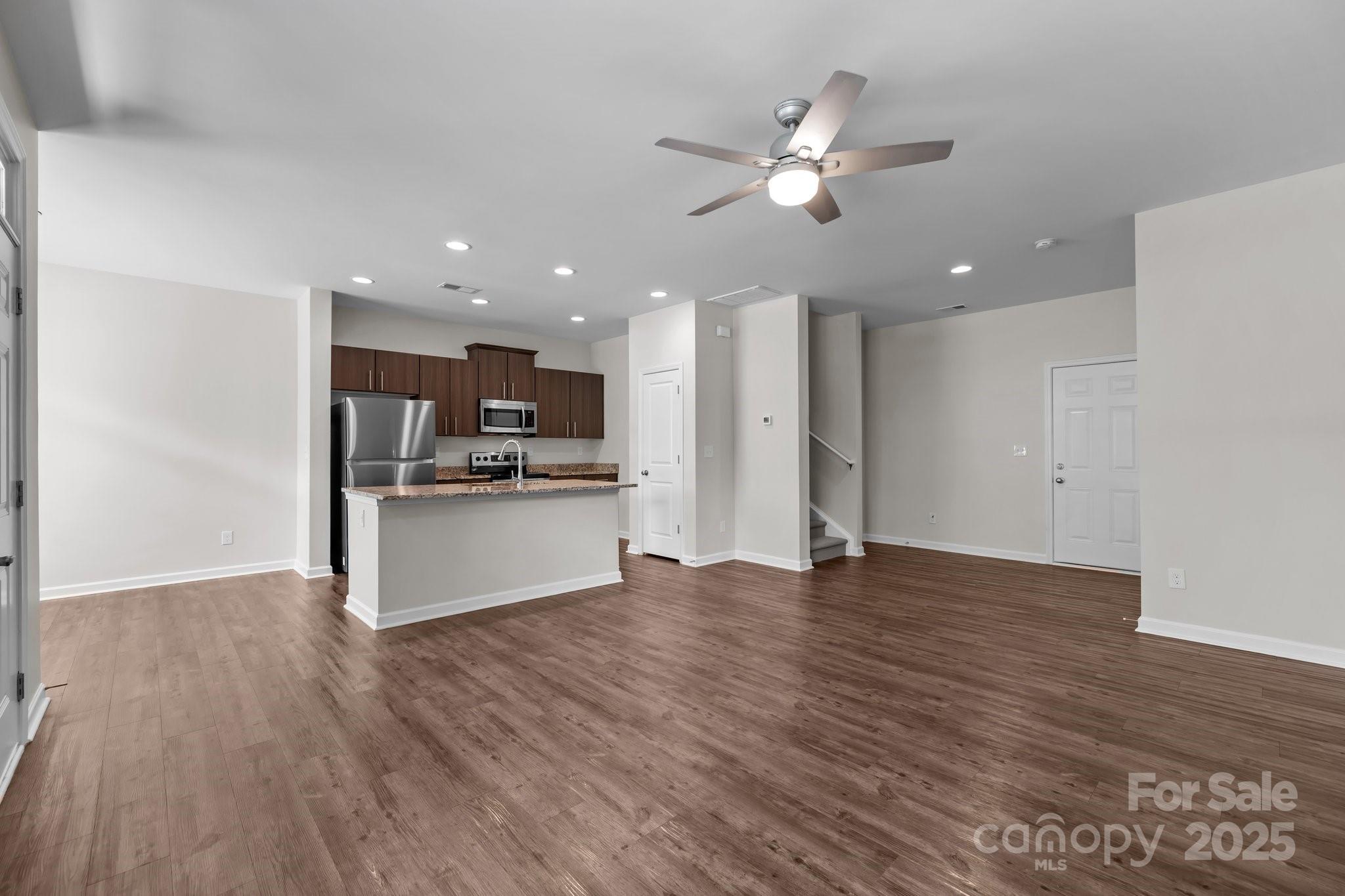 206 Overstone Court Fort Mill, SC 29715 - Photo 28 of 47 a view of kitchen with refrigerator and microwave