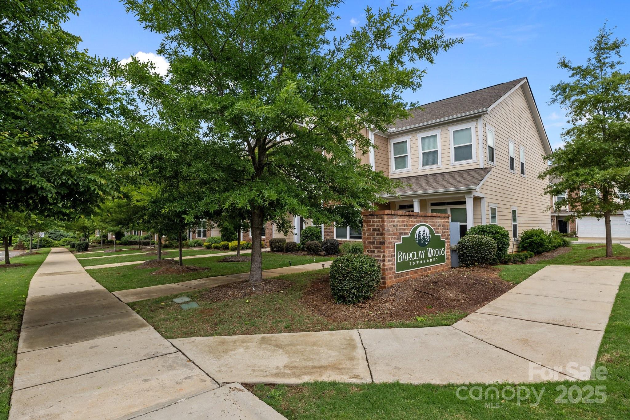 206 Overstone Court Fort Mill, SC 29715 - Photo 33 of 47 a front view of a house with a yard