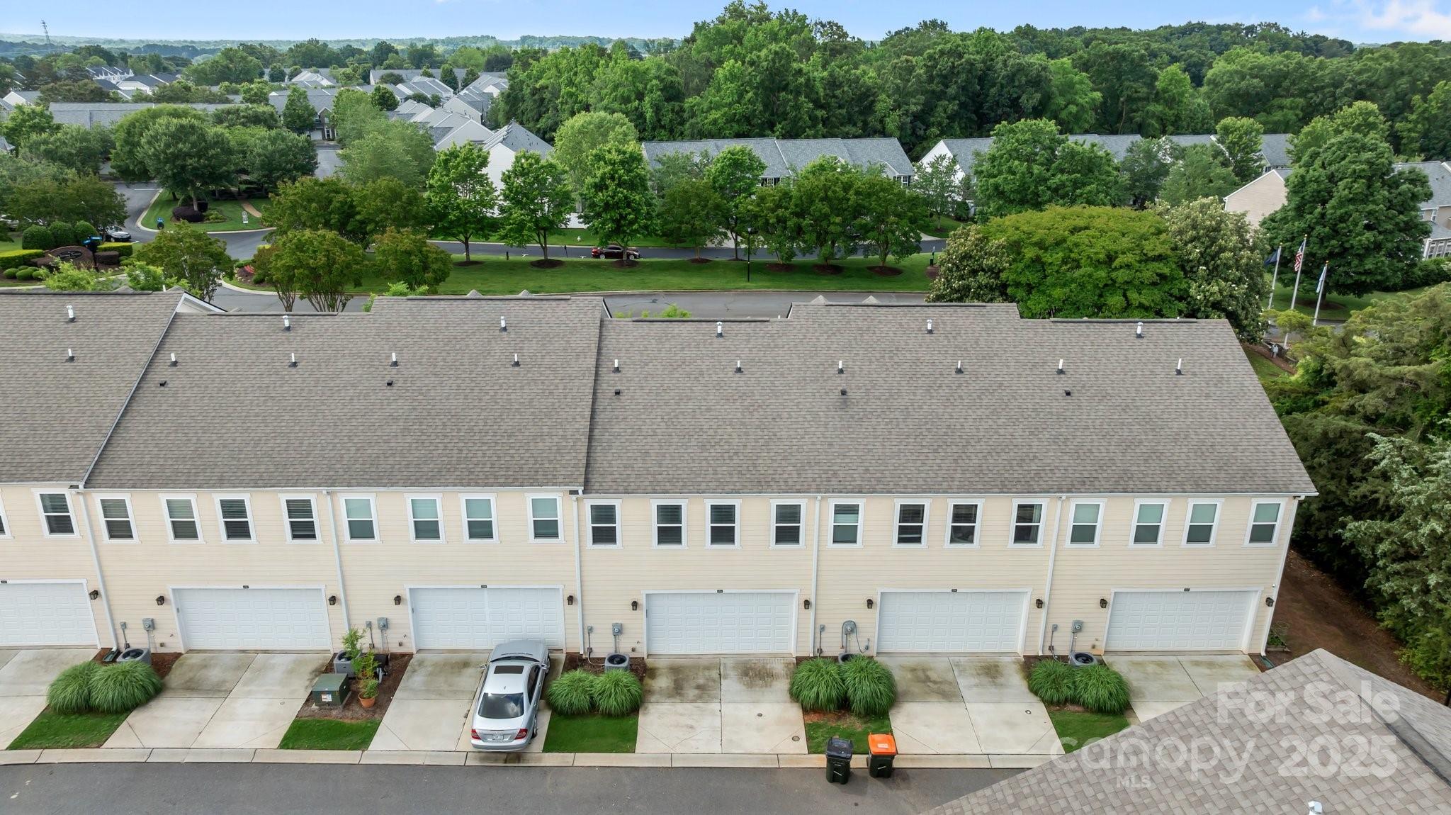 206 Overstone Court Fort Mill, SC 29715 - Photo 36 of 47 an aerial view of a house with a garden