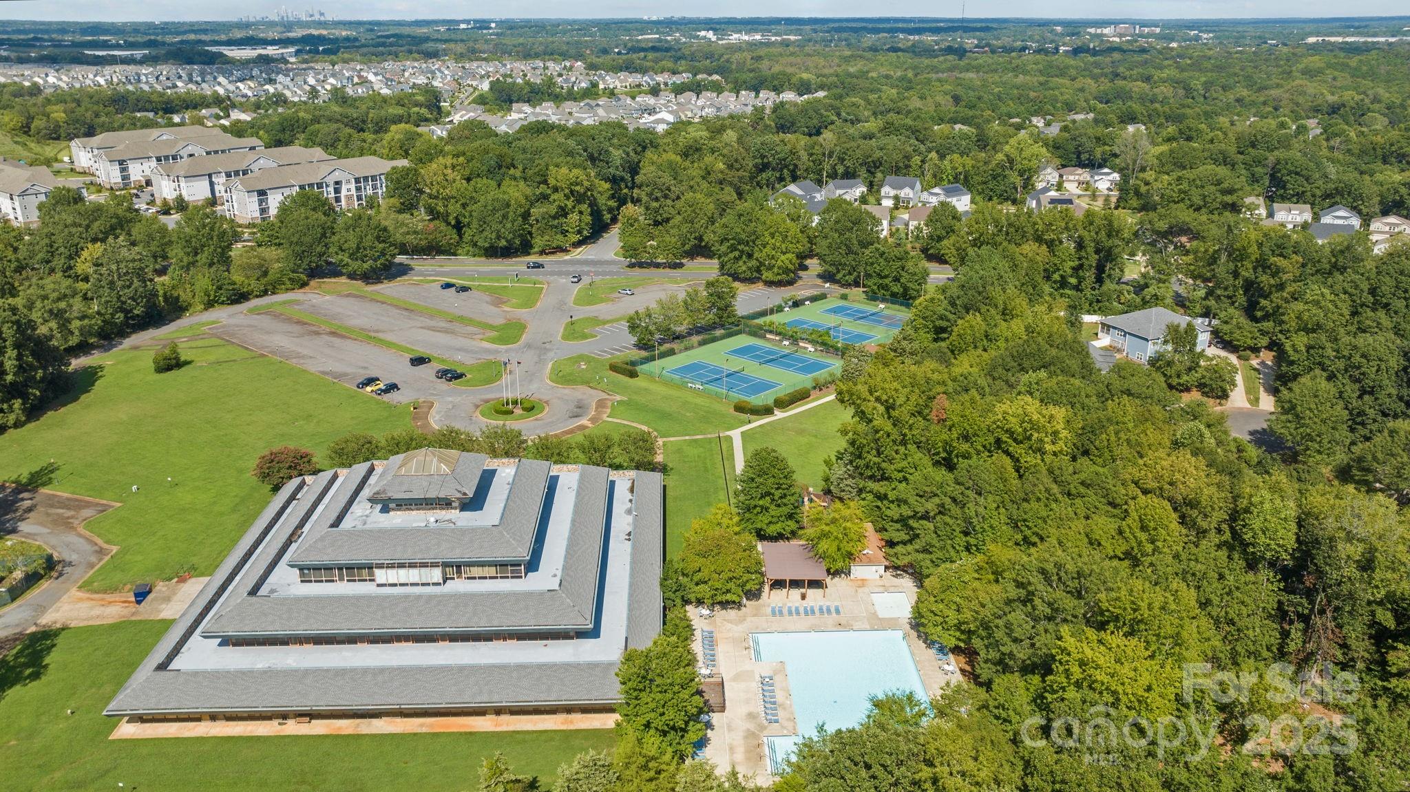 206 Overstone Court Fort Mill, SC 29715 - Photo 46 of 47 an aerial view of a residential apartment building with a yard