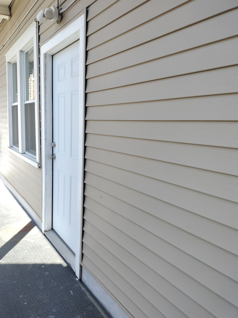 1943 West 48th Street, Unit 2 Chicago, IL 60609 - Photo 3 of 30 a view of front door