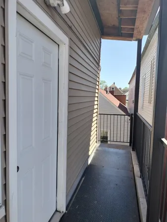 a view of a porch with a door