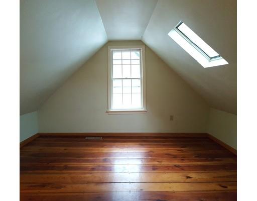 691 Bay Road Amherst, MA 01002 - Photo 17 of 30 an empty room with wooden floor and windows