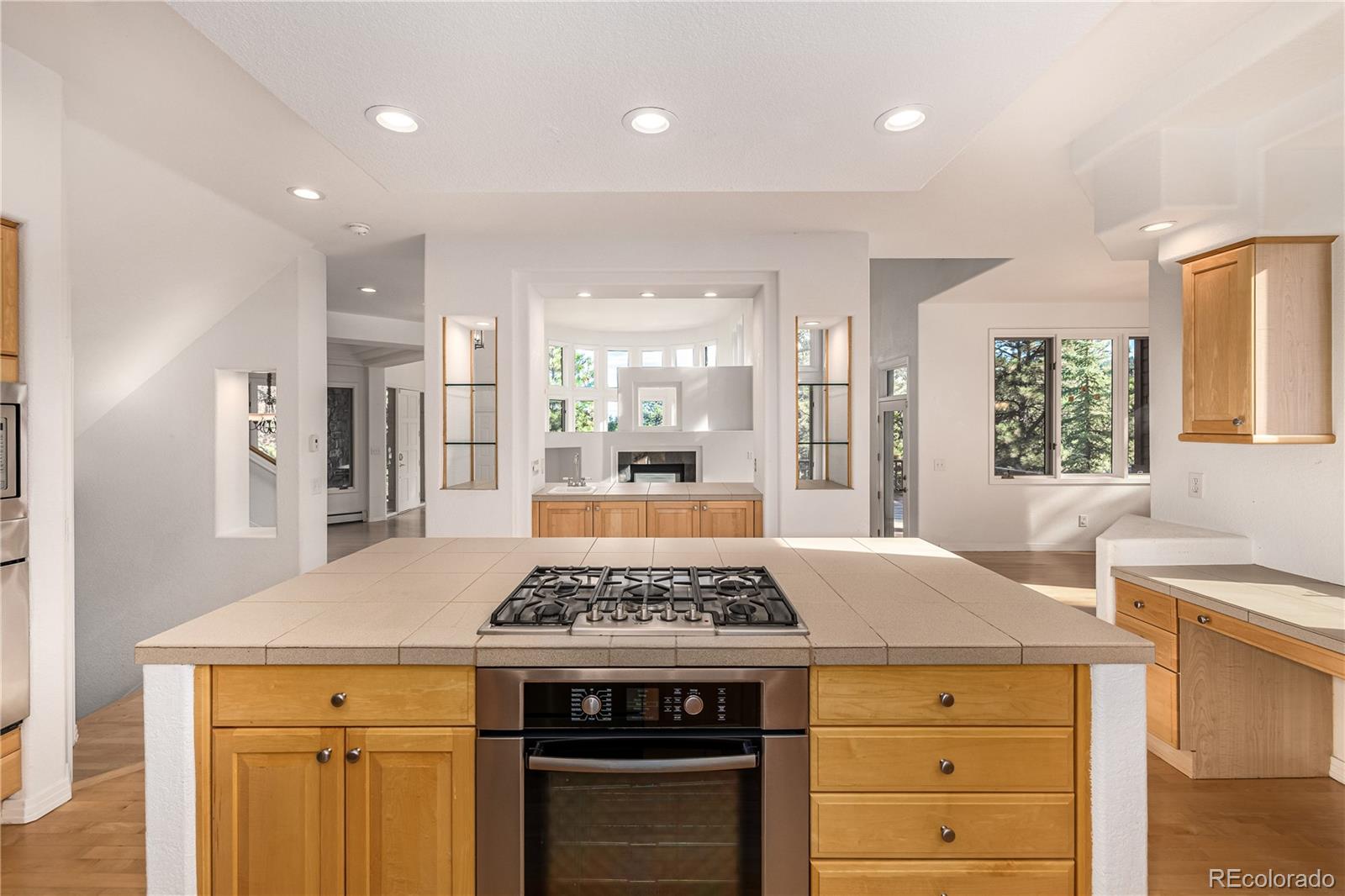 941 Sleepy Hollow Road Golden, CO 80401 - Photo 18 of 50 a kitchen with a stove and a sink