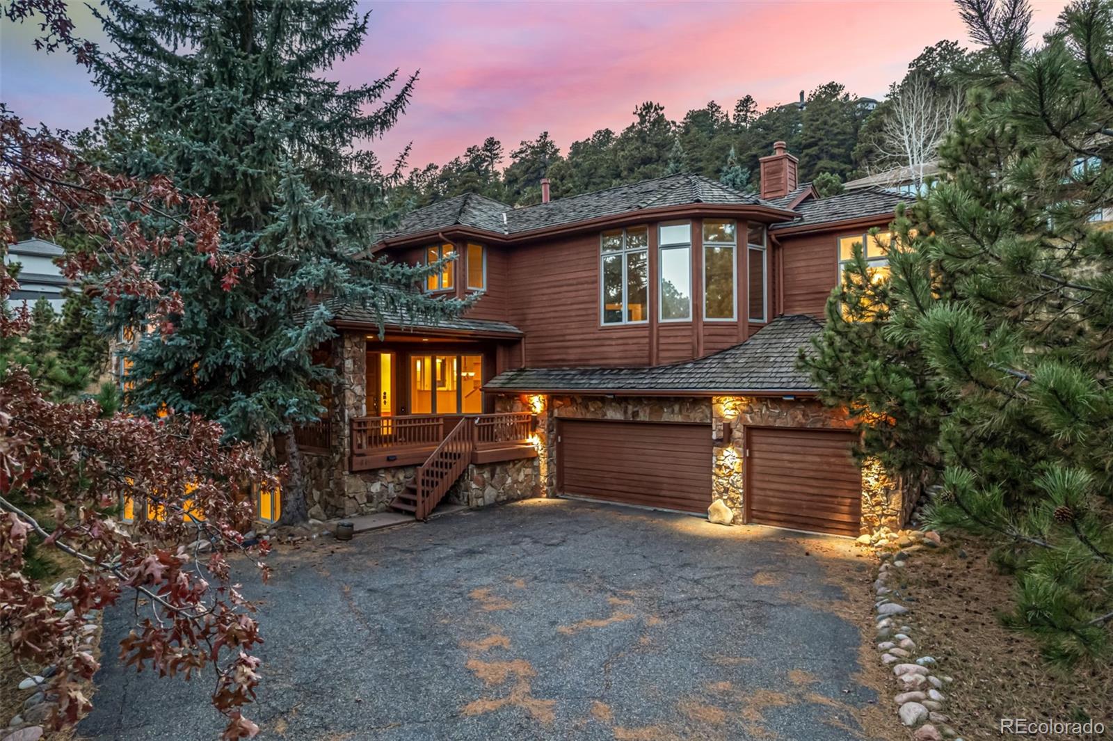941 Sleepy Hollow Road Golden, CO 80401 - Photo 43 of 50 a front view of a house with a yard