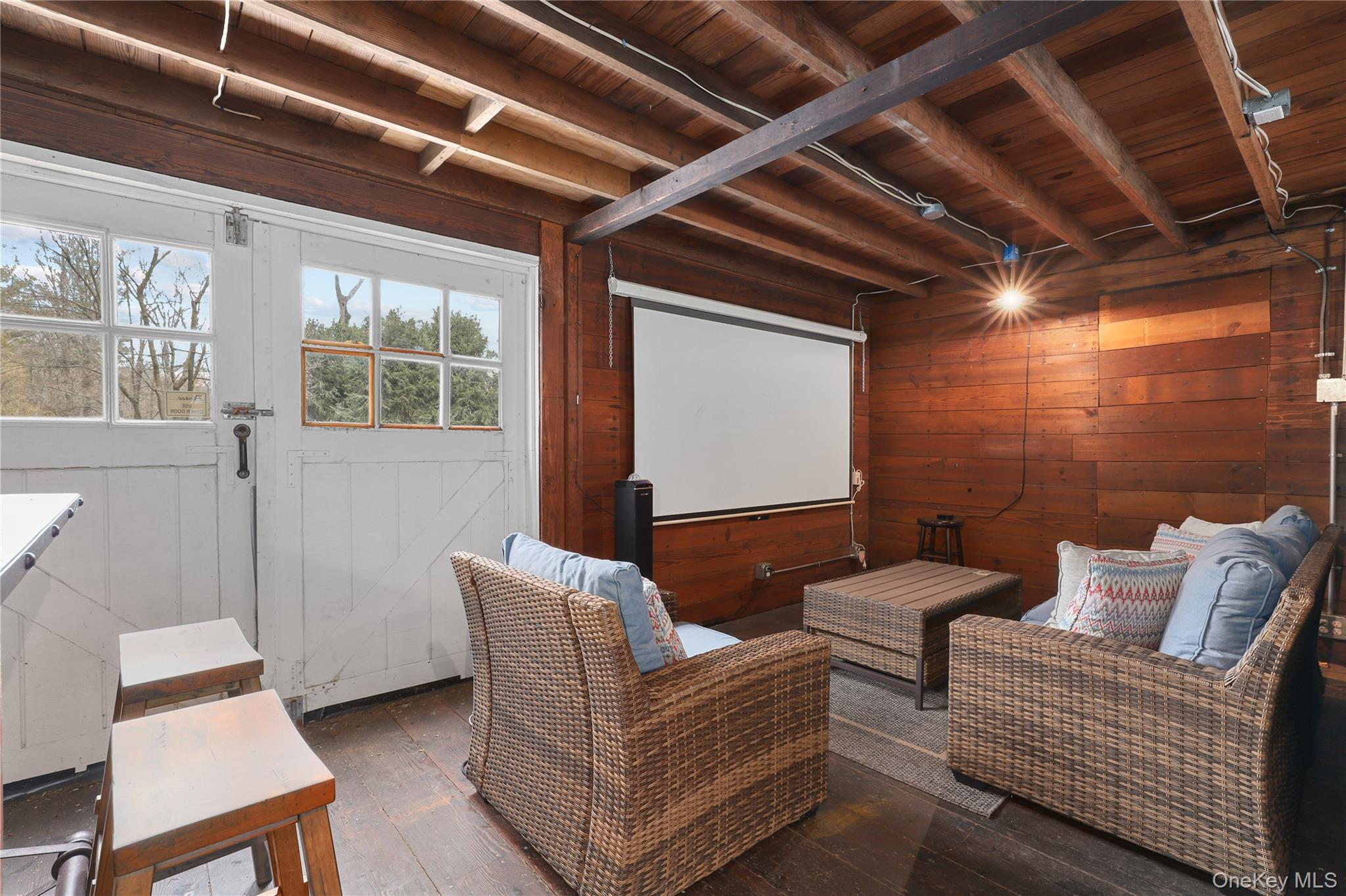 35 Hamilton Road Chappaqua, NY 10514 - Photo 23 of 29 a living room with furniture and a window