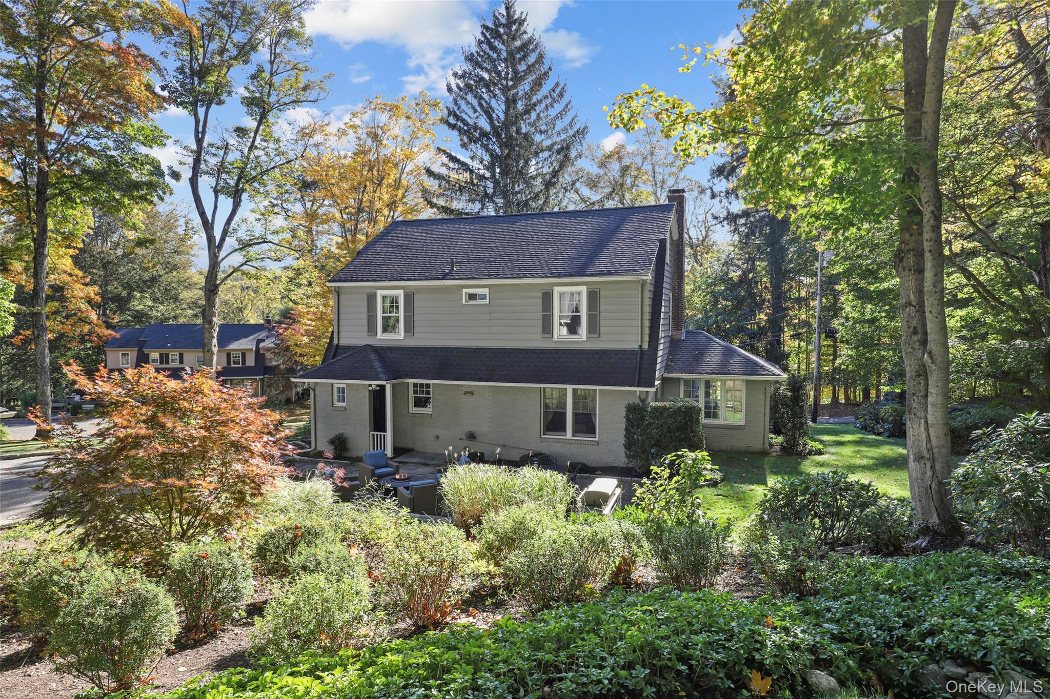 35 Hamilton Road Chappaqua, NY 10514 - Photo 27 of 29 front view of a house with a small yard