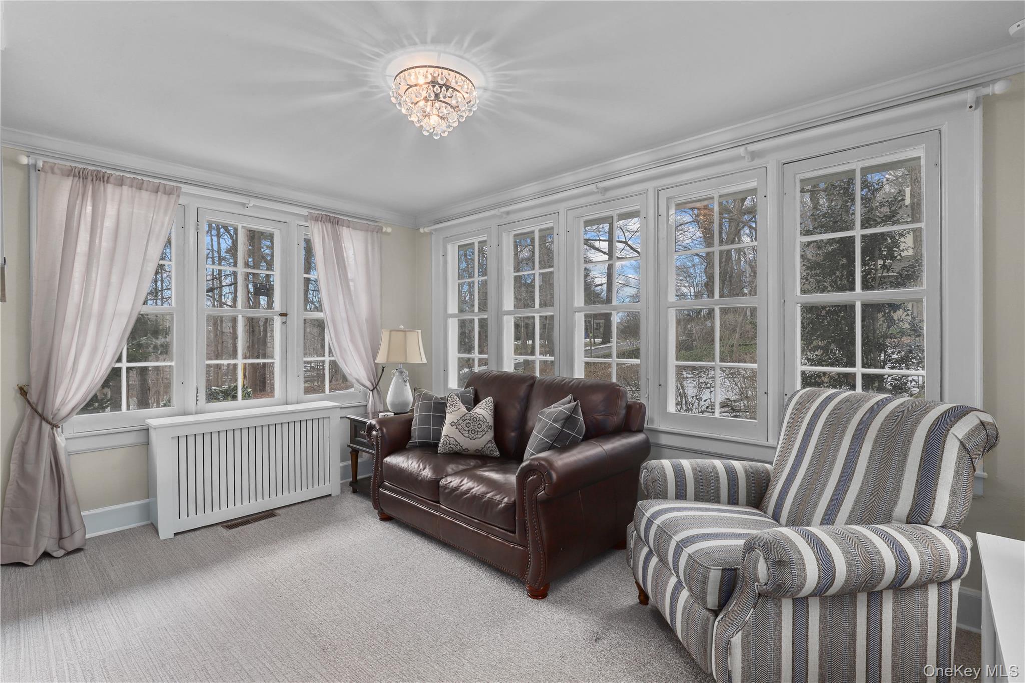 35 Hamilton Road Chappaqua, NY 10514 - Photo 4 of 29 a living room with furniture and a large window