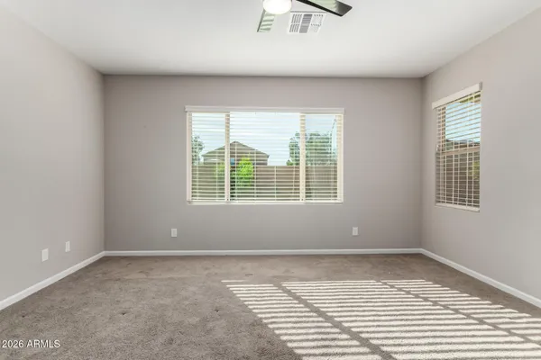 a view of a room with tiles and windows