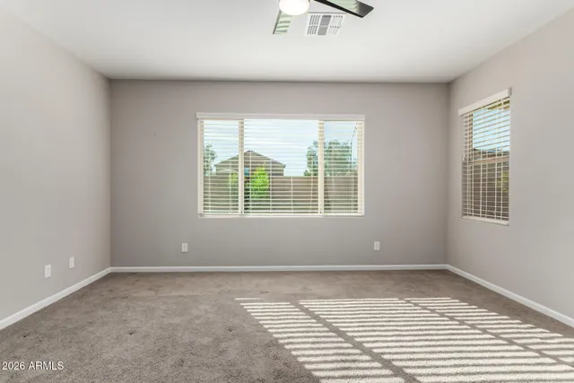 a view of a room with tiles and windows
